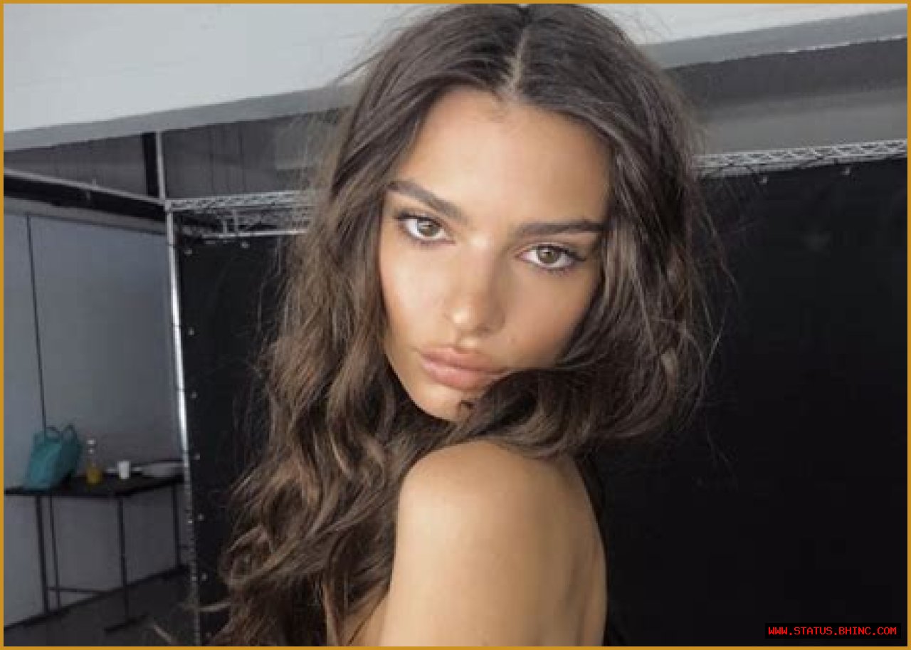 Emily Ratajkowski Puts On Cheeky Display In Barely-There Bathing Suit